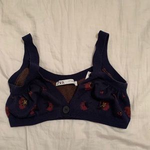 Knitted bralette with a button and floral pattern